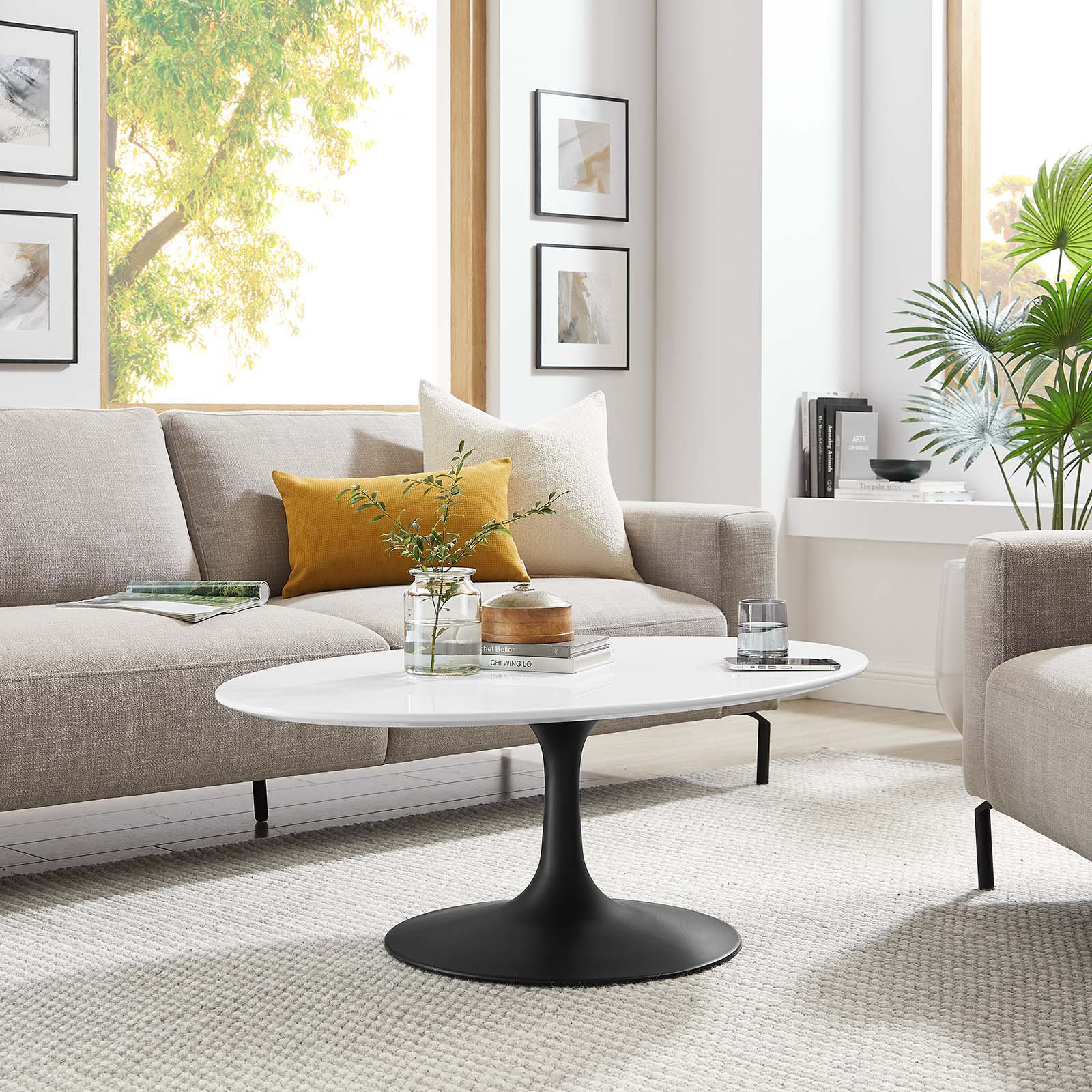 Lippa Oval Coffee Table Wade Logan Size 15.5 H x 27.5 L x 42 D Table Base Color Black Table Top Color White